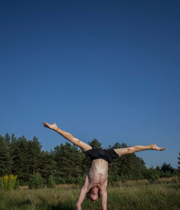 Man demonstrating a stability and strength pose.